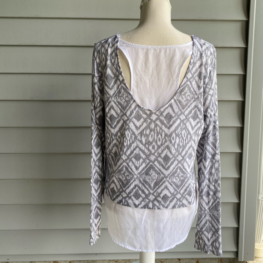 Grey and white knit top